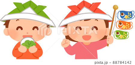 柏餅を食べる男の子と鯉のぼりを持つ女の子 88784142