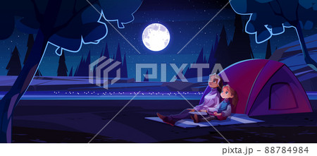 Woman and girl in summer camp at night 88784984