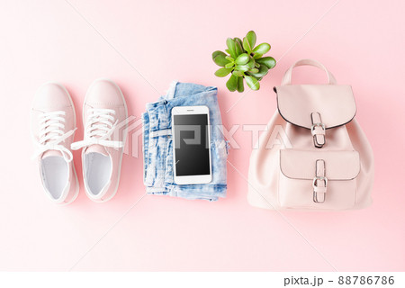 Women clothes with empty phone. Online shopping 88786786
