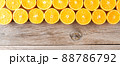 Fresh oranges on wooden background. Top view 88786792
