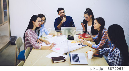 Group of coworkers considering new project 88790654