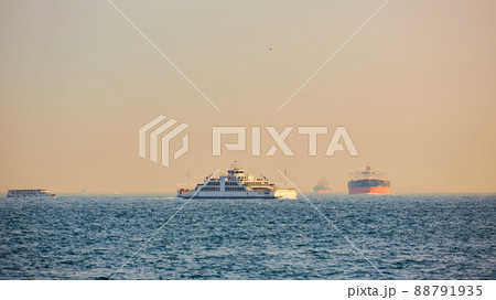 Large cargo container ship passing through Bosphorus, Istanbul, Turkey. Large cargo container ship passing through Bosphorus, Istanbul, Turkey. 88791935