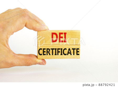 DEI diversity equity inclusion certificate symbol. Blocks with words DEI certificate on beautiful white background. Business DEI diversity equity inclusion certificate concept. Copy space. 88792421