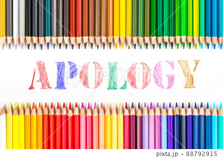Multi-colored wooden sticks Wooden colouring pencils and apology on white background 88792915
