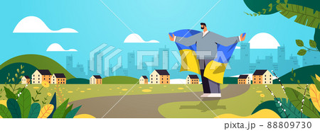 man holding Ukrainian flag outdoor pray for Ukraine peace save Ukraine from russia stop war concept 88809730