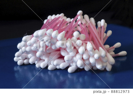 Hygienic cotton swabs on a blue table 88812973