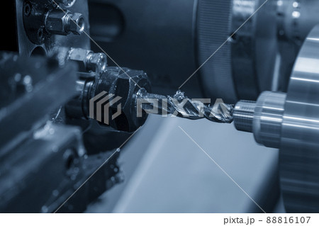 The CNC lathe machine bore cutting the brass pipe connector parts. The CNC lathe machine bore cutting the brass pipe connector parts. 88816107