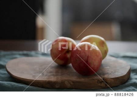 ripe nectarines on wood board with natural lighting ripe nectarines on wood board with natural lighting 88818426