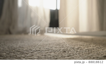 Indoor background of swaying curtains with morning sunlight Indoor background of swaying curtains with morning sunlight 88818612