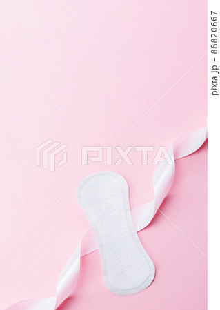 Feminine hygiene menstrual pads. Menstruation napkin for woman hygiene on pink background. Menstruation feminine period. Menstruation, critical days, zero waste, eco, ecology banner. 88820667