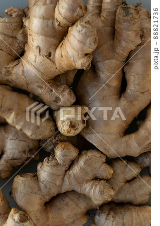 Background food with a lot of ginger root, top view 88821736