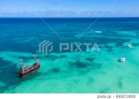 Pirate ship floating in caribbean sea. It is popular tour for tourists. Dominican Republic. Aerial view 88821800