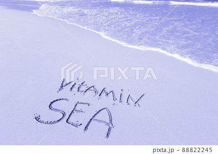 Inscription VITAMIN SEA on sandy beach Inscription VITAMIN SEA on sandy beach 88822245