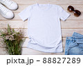 Womens white T-shirt mockup with wild grass and flowers 88827289