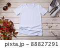 Womens white T-shirt mockup with high heels and grass 88827291