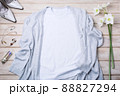 Womens white T-shirt mockup with gray cardigan and lily 88827294