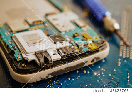 Repairing and upgrade mobile phone, electronic, computer hardware and technology concept. Repairing and upgrade mobile phone, electronic, computer hardware and technology concept. 88828768