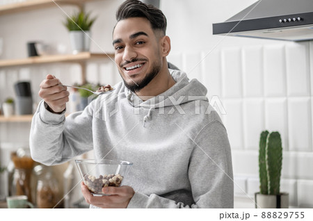 A young man spending morning at home and having coffee 88829755