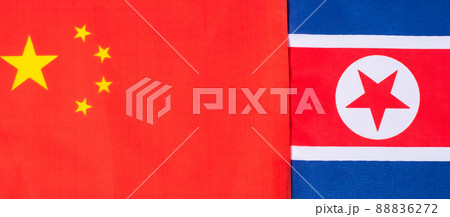 China against North Korea flags. freindship, war, conflict, Politics and relationship concept China against North Korea flags. freindship, war, conflict, Politics and relationship concept 88836272