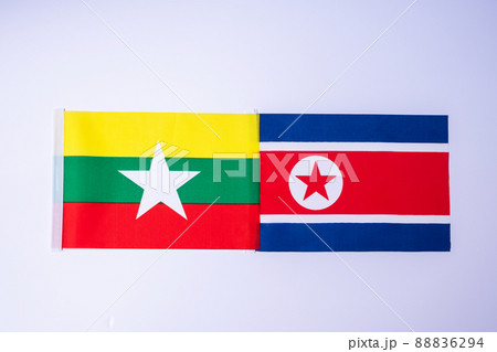 North Korea against Myanmar flags. freindship, war, conflict, Politics and relationship concept North Korea against Myanmar flags. freindship, war, conflict, Politics and relationship concept 88836294
