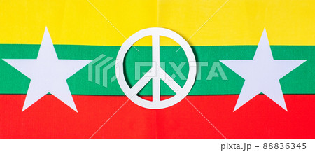Support for Myanmar people, peace dove with flag of Myanmar. Freedom, stop war, dictatorship and democracy concepts 88836345