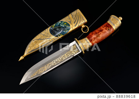 collectible silver dagger with scabbard on black 88839618