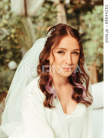 Close up portrait of beautiful bride in the park grain effect 88844281