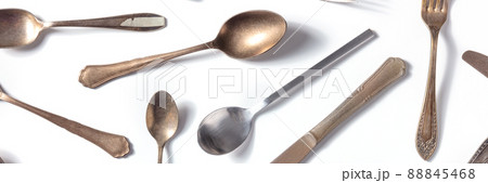 Cutlery pattern panorama. Various forks, knives, and spoons, elegant silverware 88845468