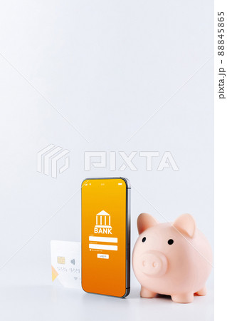 Online banking. Mobile phone with internet online bank app. Pig bank with credit card on white background. Save money business wallet. Online banking. Mobile phone with internet online bank app. Pig bank with credit card on white background. Save money business wallet. 88845865