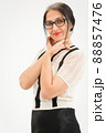 Studio photo of middle aged woman starting getting grey-haired wearing black and white clothes on white background, middle age sexy lady, happy life concept 88857476