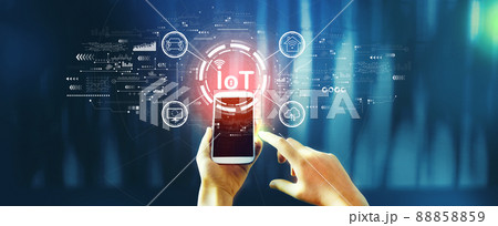 IoT theme with person using smartphone IoT theme with person using smartphone 88858859