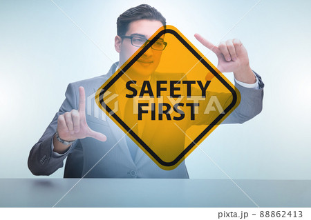 Safety first concept with businessman 88862413