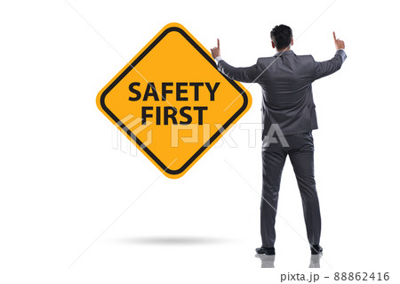 Safety first concept with businessman 88862416