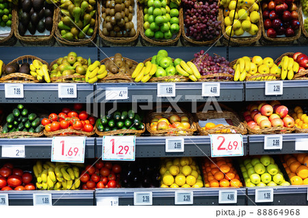 Raw fresh vegetables and fruits assortment on counter Raw fresh vegetables and fruits assortment on counter 88864968