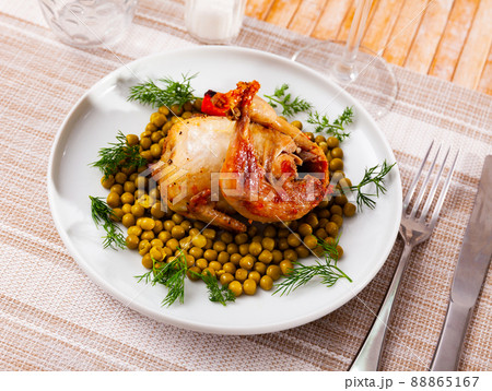 Roasted quail with carrot, green peas and fresh dill 88865167