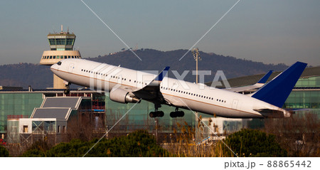 Airplane takes off from airport Barcelona Airplane takes off from airport Barcelona 88865442