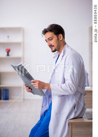 Young male doctor radiologist working in the clinic 88869436