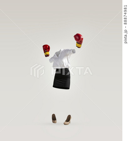 Contemporary art collage of invisible woman wearing modern business style outfit and boxing gloves on white background. Concept of fashion, style 88874981