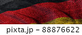 Close of grunge German flag. Grunge flag of Germany abstract 3D illustration. Dark and grungy national flag of the Federal Republic of Germany on denim fabric texture for web banner 3D rendering. 88876622