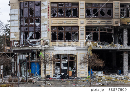 Irpin, Kyev region Ukraine - 09.04.2022: Cities of Ukraine after the Russian occupation. Destroyed buildings on the streets of Irpen. Broken, shelled windows. Buildings after being hit by missiles. Irpin, Kyev region Ukraine - 09.04.2022: Cities of Ukraine after the Russian occupation. Destroyed buildings on the streets of Irpen. Broken, shelled windows. Buildings after being hit by missiles. 88877609