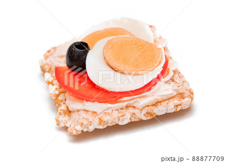 Rice Cake Sandwich with Tomato, Eggs and Olives - Isolated 88877709
