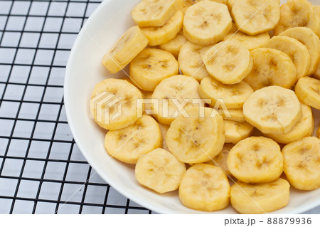 Banana slices isolated on white background 88879936