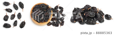 Black raisin isolated on white background with clipping path. Top view. Flat lay. Set or collection 88885363