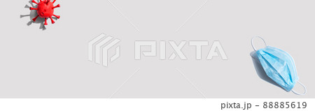 Surgical mask with influenza and Coronavirus concept 88885619