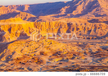 Aerial view of Hatshepsut Mortuary Temple at Deir el-Bahari in The morning. Aerial view of Hatshepsut Mortuary Temple at Deir el-Bahari in The morning. 88886709