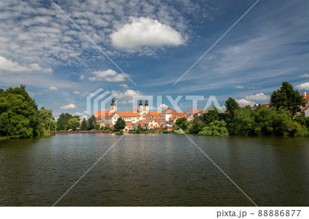 Telc cityscape in Czech republic, in the background Church of the Name of Jesus, in the foreground pond Ulicky Telc cityscape in Czech republic, in the background Church of the Name of Jesus, in the foreground pond Ulicky 88886877
