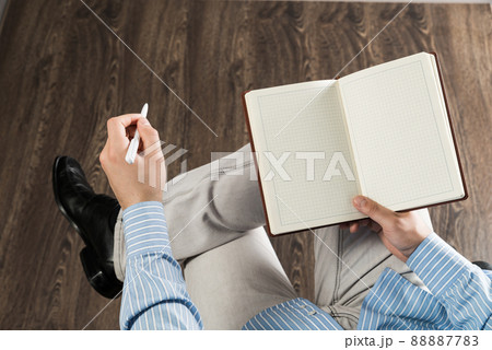 businessman with notepad, works in the office businessman with notepad, works in the office 88887783
