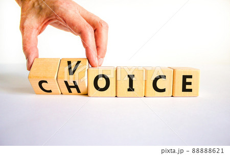 Voice and choice symbol. Businessman turns wooden cubes and changes the concept word choice to voice. Beautiful white table, white background, copy space. Business and voice and choice concept. Voice and choice symbol. Businessman turns wooden cubes and changes the concept word choice to voice. Beautiful white table, white background, copy space. Business and voice and choice concept. 88888621