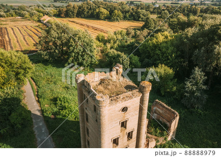 Aerial View Remains Of Yastrzhembsky Estate And Park Complex. Top View Of Old Five-storey Brick Water Tower. Drone View Of Beautiful European Nature From High Attitude In Summer Season. Bird's Eye 88888979