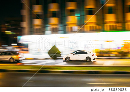 Speeding Car Fast Driving In City Street. Motion Blur Background 88889028